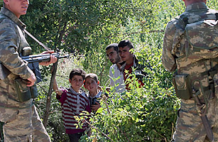 Desperately Fleeing Syria: Refugees Cross into Turkey