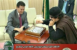 Russian Space Oddity: Ground Control to Colonel Gaddafi