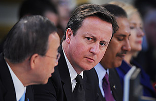 Cameron Defends Arrested Aide Coulson in Hacking Scandal