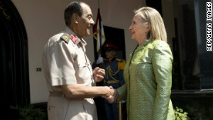 120715110830-clinton-egypt-military-story-body Field Marshal Mohamed Tantawi greets U.S. Secretary of State Hillary Clinton before a meeting in Cairo.