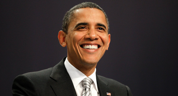 101215_obama_smile_tax_reut_605
